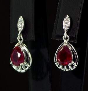 Серебряные серьги 925 пробы 2,99 гр. с африканскими Роял рубинами класса AAAA и топазами из США 3,46 карат Серебряные серьги 925 пробы 2,99 гр. с африканскими Роял рубинами класса AAAA и топазами из США 3,46 карат