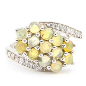 Серебряное кольцо 925 пробы 3,85 гр. с эфиопскими опалами класса ААА и белыми цирконами 1,28 карат Серебряное кольцо 925 пробы 3,85 гр. с эфиопскими опалами класса ААА и белыми цирконами 1,28 карат