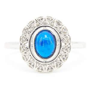 Серебряное кольцо 925 пробы 3,53 гр. с эфиопским голубым опалом класса AAA и топазами 0,64 карат с коллекции Серебряное кольцо 925 пробы 3,53 гр. с эфиопским голубым опалом класса AAA и топазами 0,64 карат с коллекции