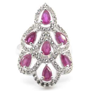 Серебряное кольцо 925 пробы 4,93 гр. с розовыми рубинами из Кении класса AAAA и топазами 2,36 карат с коллекции Серебряное кольцо 925 пробы 4,93 гр. с розовыми рубинами из Кении класса AAAA и топазами 2,36 карат с коллекции