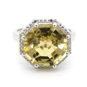 Серебряное кольцо 925 пробы 6,5 гр. с боливийским гелиодором и топазами 9,55 карат с коллекции Серебряное кольцо 925 пробы 6,5 гр. с боливийским гелиодором и топазами 9,55 карат с коллекции