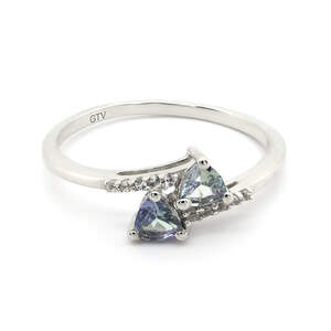 Серебряное кольцо 925 пробы 1,76 гр. с танзанитом Маньяра класса АААА и белыми топазами с США 0,47 карат Серебряное кольцо 925 пробы 1,76 гр. с танзанитом Маньяра класса АААА и белыми топазами с США 0,47 карат