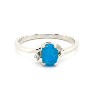 Серебряное кольцо 925 пробы 2,05 гр. с голубым эфиопским опалом класса АААА и белыми топазами из США 0,51 карат Серебряное кольцо 925 пробы 2,05 гр. с голубым эфиопским опалом класса АААА и белыми топазами из США 0,51 карат