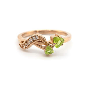 Серебряное кольцо 925пр в поз.750пр 2,39г с египетскими перидотами и белыми топазами с США 0,42к Серебряное кольцо 925пр в поз.750пр 2,39г с египетскими перидотами и белыми топазами с США 0,42к