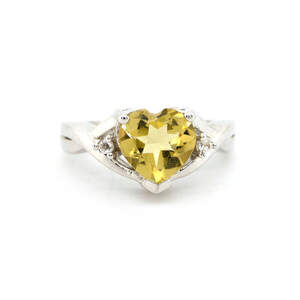 Серебряное кольцо 925 пробы 3,57 гр. с боливийским гелиодором и топазами 1,51 карат с коллекции Серебряное кольцо 925 пробы 3,57 гр. с боливийским гелиодором и топазами 1,51 карат с коллекции