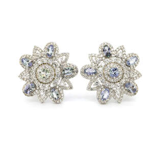 Серебряные серьги 925 пробы 11,41 гр. с танзанитами Маньяра класса AAAA и топазами 6,04 карат с коллекции Серебряные серьги 925 пробы 11,41 гр. с танзанитами Маньяра класса AAAA и топазами 6,04 карат с коллекции
