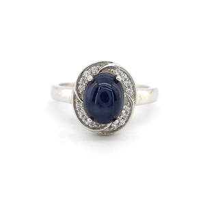 Серебряное кольцо 925 пробы 3,31 гр. со шри-ланкийским звездчатым Сапфиром класса АААА и топазами с США 3,24 карат Серебряное кольцо 925 пробы 3,31 гр. со шри-ланкийским звездчатым Сапфиром класса АААА и топазами с США 3,24 карат