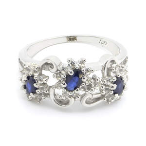 Срібна каблучка 925 проби 4,03 г з блакитним шрі-ланкійським сапфіром АААА та білими топазами з США 1,39 карат
