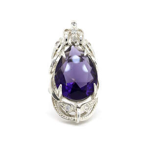 Серебряное кольцо 925 пробы 8,75 г с фиолетовим альпинитом и цирконами 11,35 карат Серебряное кольцо 925 пробы 8,75 г с фиолетовим альпинитом и цирконами 11,35 карат
