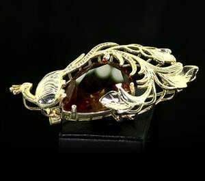 Срібна брошка 925 проби в позолоті 375 проби 26,31 г з турецьким Султанітом класу АААА та цирконами 15.77 карат