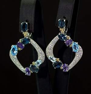 Срібні ережки 925 проби 6,9 г з бразильськими Аметастами, Топазами та цирконами 7,45 карат Срібні ережки 925 проби 6,9 г з бразильськими Аметастами, Топазами та цирконами 7,45 карат