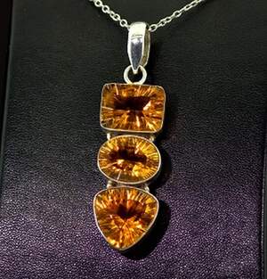 Підвіска у срібному покритті з Імператорськими топазами 11,81 г