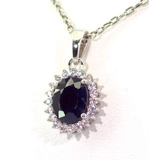 Срібна підвіска 925 проби 2,25 г з блакитним шрі-ланкійським Сапфіром класу АААА та топазами зі США 3,4 карат