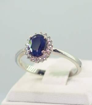 Срібна каблучка 925 проби 2,74 г з блакитним шрі-ланкійським Сапфіром класу АААА та топазами зі США 2,14 карат