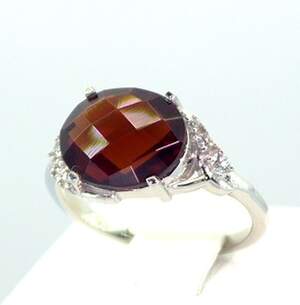 Серебряное кольцо 925 пробы 3,62 г с мозамбикским Гранатом и цирконами 5,61 карат Серебряное кольцо 925 пробы 3,62 г с мозамбикским Гранатом и цирконами 5,61 карат