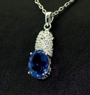 Серебряная подвеска 925 пробы 4,8 гр. с Флюоритом Блу Джон и топазами из США 6,04 карат Серебряная подвеска 925 пробы 4,8 гр. с Флюоритом Блу Джон и топазами из США 6,04 карат
