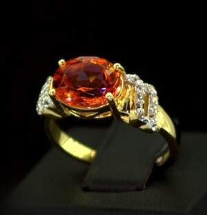 Срібна каблучка 925 проби з позолотою 750 проби 2,98 г з Кварцами Падпараджа та топазами зі США 2,56 карат Срібна каблучка 925 проби з позолотою 750 проби 2,98 г з Кварцами Падпараджа та топазами зі США 2,56 карат