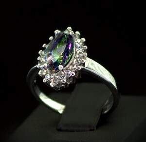 Срібна каблучка 925 проби 4,12 г з мітичним Топазом та цирконами 14 карат Срібна каблучка 925 проби 4,12 г з мітичним Топазом та цирконами 14 карат