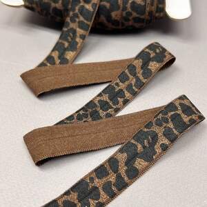 Бейка трикотажная-стрейч лео коричневый -1,5 см