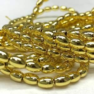 Бусины Гематит рис 4х6 мм, (70шт) - цвет Лимонное золото