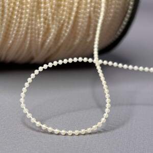 Бусины на нитке, Ø1,5мм - Айвори