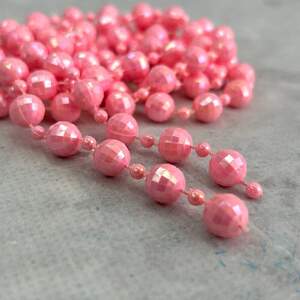 Бусины пластиковые на нитке Ø 4 и 9 мм - 90 см розовый с АВ Бусины пластиковые на нитке Ø 4 и 9 мм - 90 см розовый с АВ