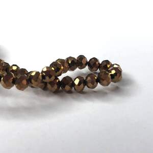 Бусины хрустальные рондель 4х3мм, нить-130 шт, медный напыление Бусины хрустальные рондель 4х3мм, нить-130 шт, медный напыление