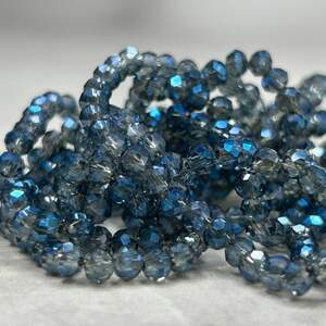 Бусины хрустальные рондель 4х3мм, нить-130 шт, прозрачный серый с синим отливом Бусины хрустальные рондель 4х3мм, нить-130 шт, прозрачный серый с синим отливом