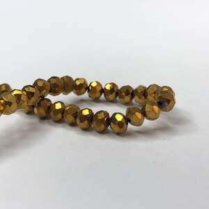 Бусины хрустальные рондель 4х3мм, нить-130 шт, темное золотое напыление Бусины хрустальные рондель 4х3мм, нить-130 шт, темное золотое напыление