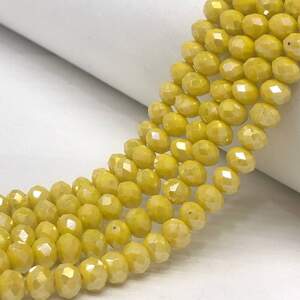 Бусины хрустальные рондель 8х6мм, нить-60 шт, желтый матовый с покрытием АВ Бусины хрустальные рондель 8х6мм, нить-60 шт, желтый матовый с покрытием АВ