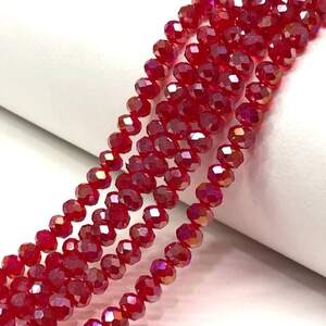 Бусины хрустальные рондель 8х6мм, нить-60 шт, красный прозрачный с АВ Бусины хрустальные рондель 8х6мм, нить-60 шт, красный прозрачный с АВ