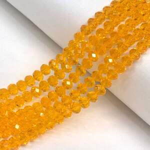 Бусины хрустальные рондель 8х6мм, нить-60 шт, оранжевый прозрачный Бусины хрустальные рондель 8х6мм, нить-60 шт, оранжевый прозрачный