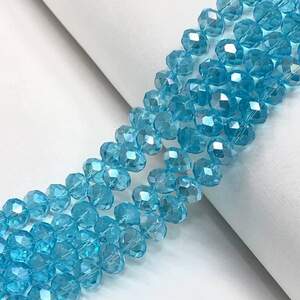 Бусины хрустальные рондель 8х6мм, нить-65 шт, голубой прозрачный Бусины хрустальные рондель 8х6мм, нить-65 шт, голубой прозрачный