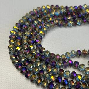 Бусины хрустальные рондель 8х6мм, нить-65 шт, зеркальный серый с сиреневым Бусины хрустальные рондель 8х6мм, нить-65 шт, зеркальный серый с сиреневым