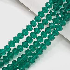 Бусины хрустальные рондель 8х6мм, нить-65 шт, изумрудный прозрачный Бусины хрустальные рондель 8х6мм, нить-65 шт, изумрудный прозрачный