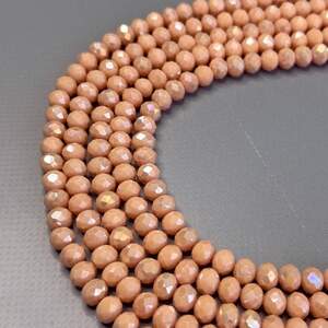 Бусины хрустальные рондель 8х6мм, нить-65 шт, матовый бежевый с АВ Бусины хрустальные рондель 8х6мм, нить-65 шт, матовый бежевый с АВ