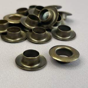 Люверс D-10мм нерж. с пласт. кольцом-антик (100шт) (матр.00257)