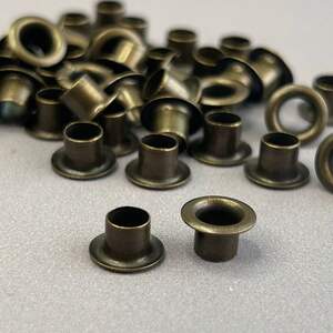 Люверс D-4мм нержавейка с пластиковым кольцом-антик (100шт) (матр.00253)