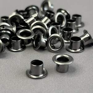 Люверс D-4мм нержавейка с пластиковым кольцом-темный никель (100шт) (матр.00253)