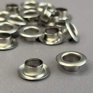 Люверс D-8мм нерж. с пласт. кольцом-никель (100шт) (матр.00256)