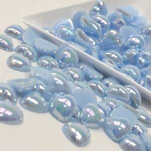 Полубусины сердечки 10мм, #А10 с покрытием АВ - 25шт/уп Полубусины сердечки 10мм, #А10 с покрытием АВ - 25шт/уп