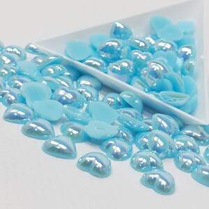 Полубусины сердечки 10мм, #А3 с покрытием АВ - 25шт/уп Полубусины сердечки 10мм, #А3 с покрытием АВ - 25шт/уп