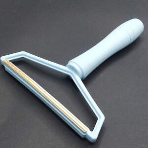 Прибор для снятия катышек с одежды