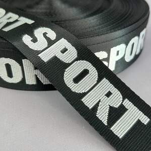 Стропа ременная гладкая 38 мм - черная с надписью Sport Стропа ременная гладкая 38 мм - черная с надписью Sport