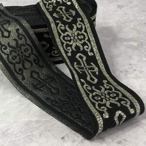 Тесьма церковная люрекс 50 мм - черная с золотом светлое Тесьма церковная люрекс 50 мм - черная с золотом светлое