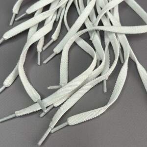 Шнурок для обуви резиновый плоский 100 см длина, Ø 7 мм - белый Шнурок для обуви резиновый плоский 100 см длина, Ø 7 мм - белый