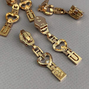 #01 Бегунок для спиральной молнии 7 - золото #01 Бегунок для спиральной молнии 7 - золото