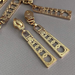 #05 Бегунок для спиральной молнии 7 - золото #05 Бегунок для спиральной молнии 7 - золото