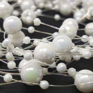 (5шт по 1,3 метра) Бусины на леске Ø8 и Ø3мм Цвет - белый с АВ (5шт по 1,3 метра) Бусины на леске Ø8 и Ø3мм Цвет - белый с АВ