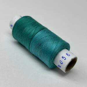 056/233 Нитки в катушках 40/2 , половинки (катушка 2х75м)